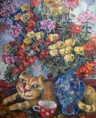 Рыжий кот и чашка